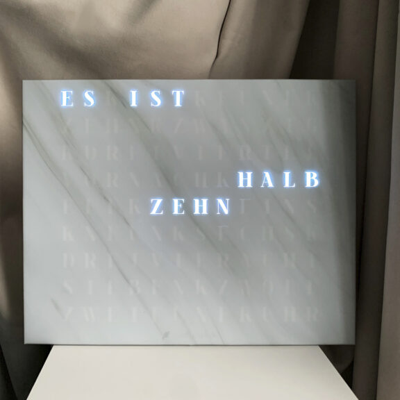 Wordclock Jupiter White Marble Design closeup