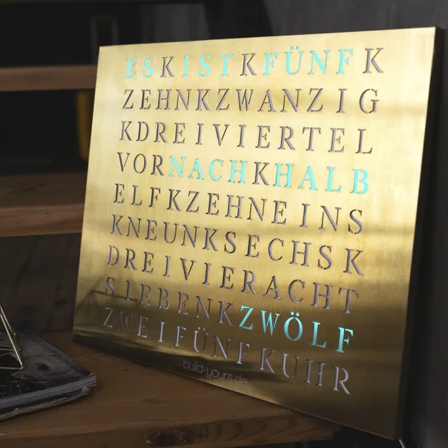 Wordclock Jupiter Edelstahl gelasert in Gold