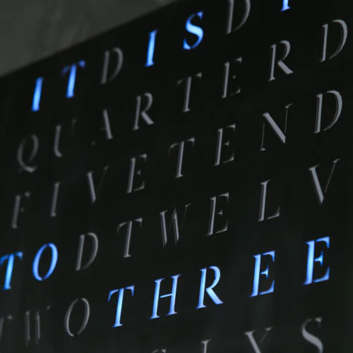 Wordclock Jupiter Edelstahl gelasert in matt Schwarz - Englische Version