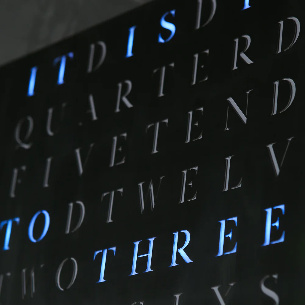 Wordclock Jupiter Edelstahl gelasert in matt Schwarz - Englische Version