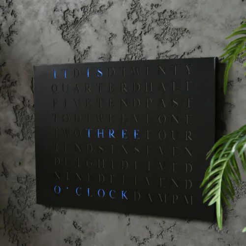 Wordclock Jupiter Edelstahl gelasert in matt Schwarz - Englische Version